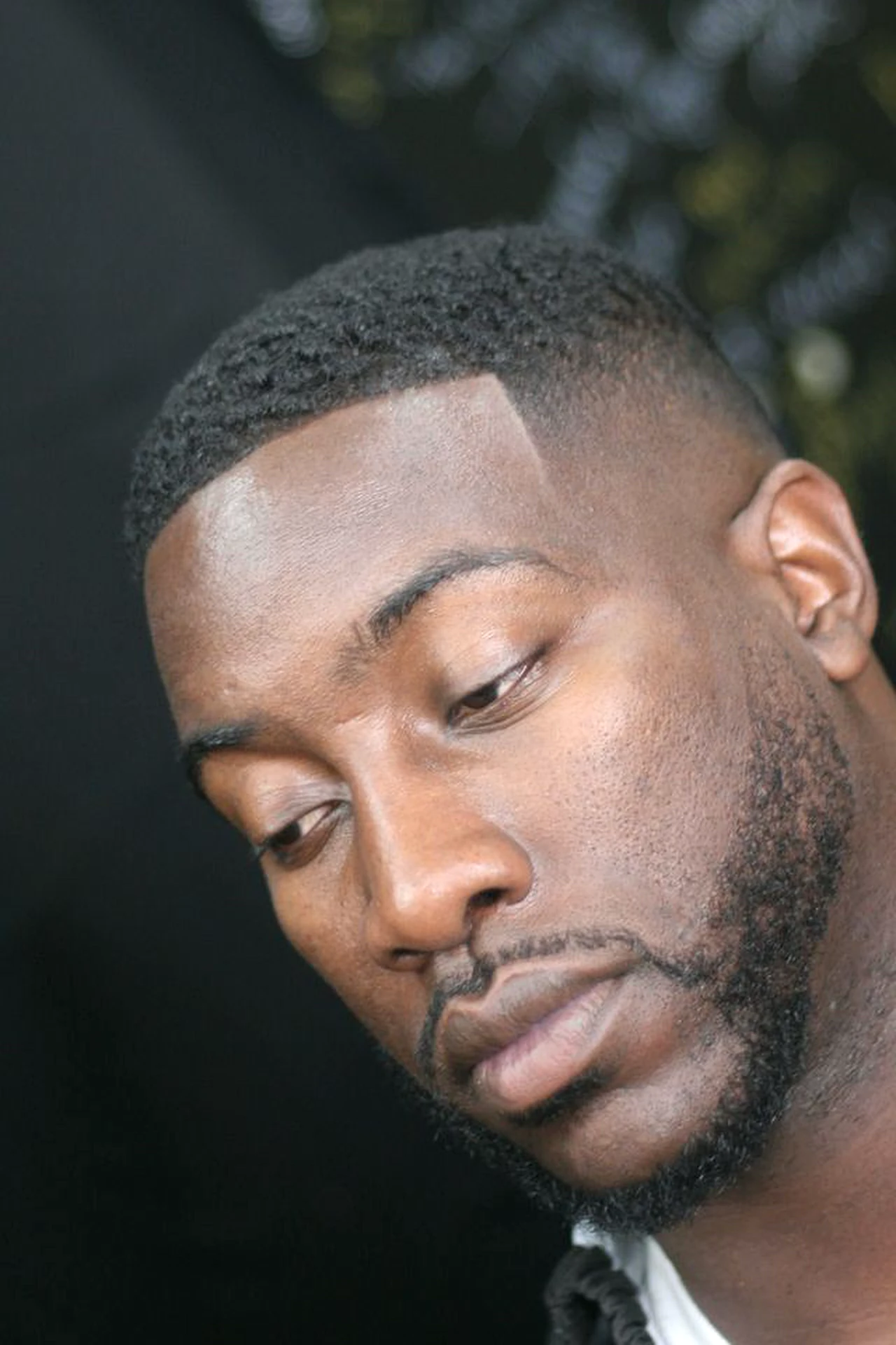 Crisp fade and shaped beard by Ivey League Barber