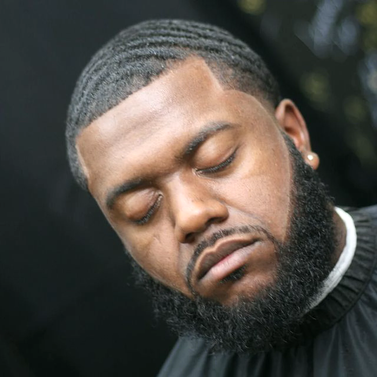 Wave cut with a full beard by Ivey League Barber